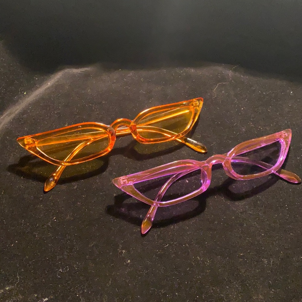 Two pair of cats eye glasses